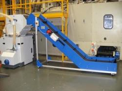 conveyor with metal detection stop and alarm
